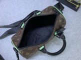 Louis Vuitton Monogram Macassar Keepall Bandouliere 25 in Minty Green interior view
