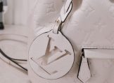 Louis Vuitton Montsouris PM Backpack in White Embossed Leather