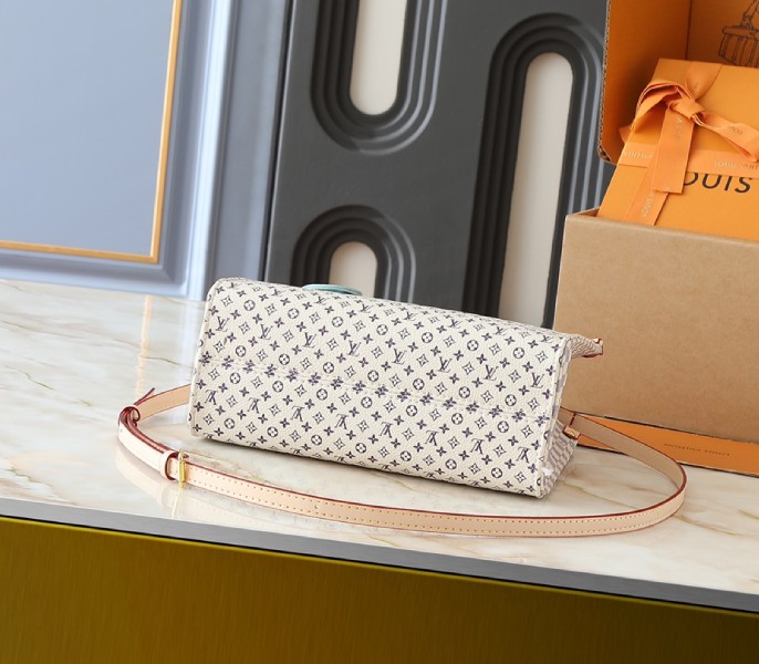 Louis Vuitton Romance Onthego PM in Sand & Azure Blue down view Louis Vuitton Romance Onthego PM in Sand & Azure Blue down view