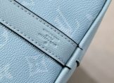 Louis Vuitton Taiga Leather Keepall Bandoulière 50 Travel Bag in Miami Green close up