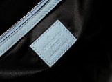 Louis Vuitton Taiga Leather Keepall Bandoulière 50 Travel Bag in Miami Green logo view