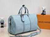 Louis Vuitton Taiga Leather Keepall Bandoulière 50 Travel Bag in Miami Green side view